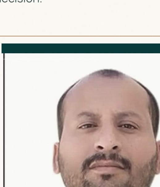 الدكتور المهندس عبدالمجيد العامري ببدلة رسمية